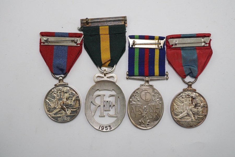 Four ERII service medals; Imperial Service medal to Alexander Manuel, another to Sydney John Jeffery (Technician Class IIA, Telecommunications Headquarters; Civil Defence Long Service unnamed; Territorial Efficiency Deco